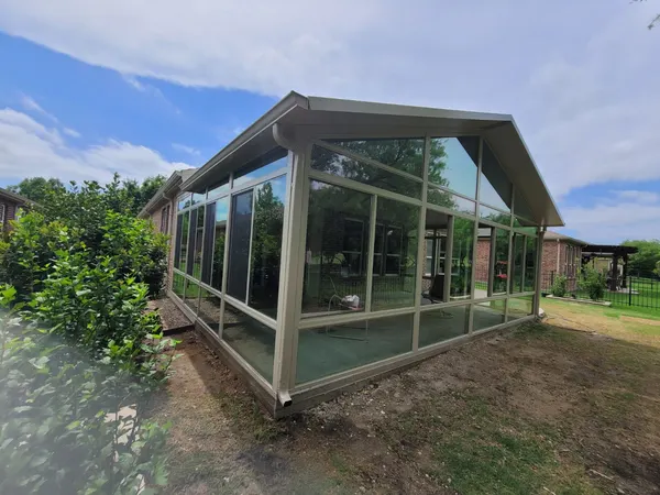 Glass patio enclosure sunroom with gabled roof — CertiPro project, DFW