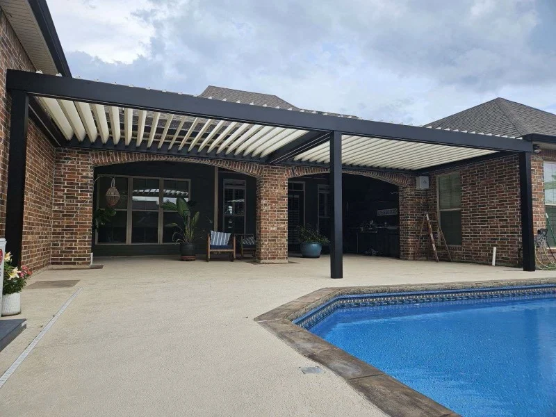 Louvered patio cover with poolside seating area — Tarrant County